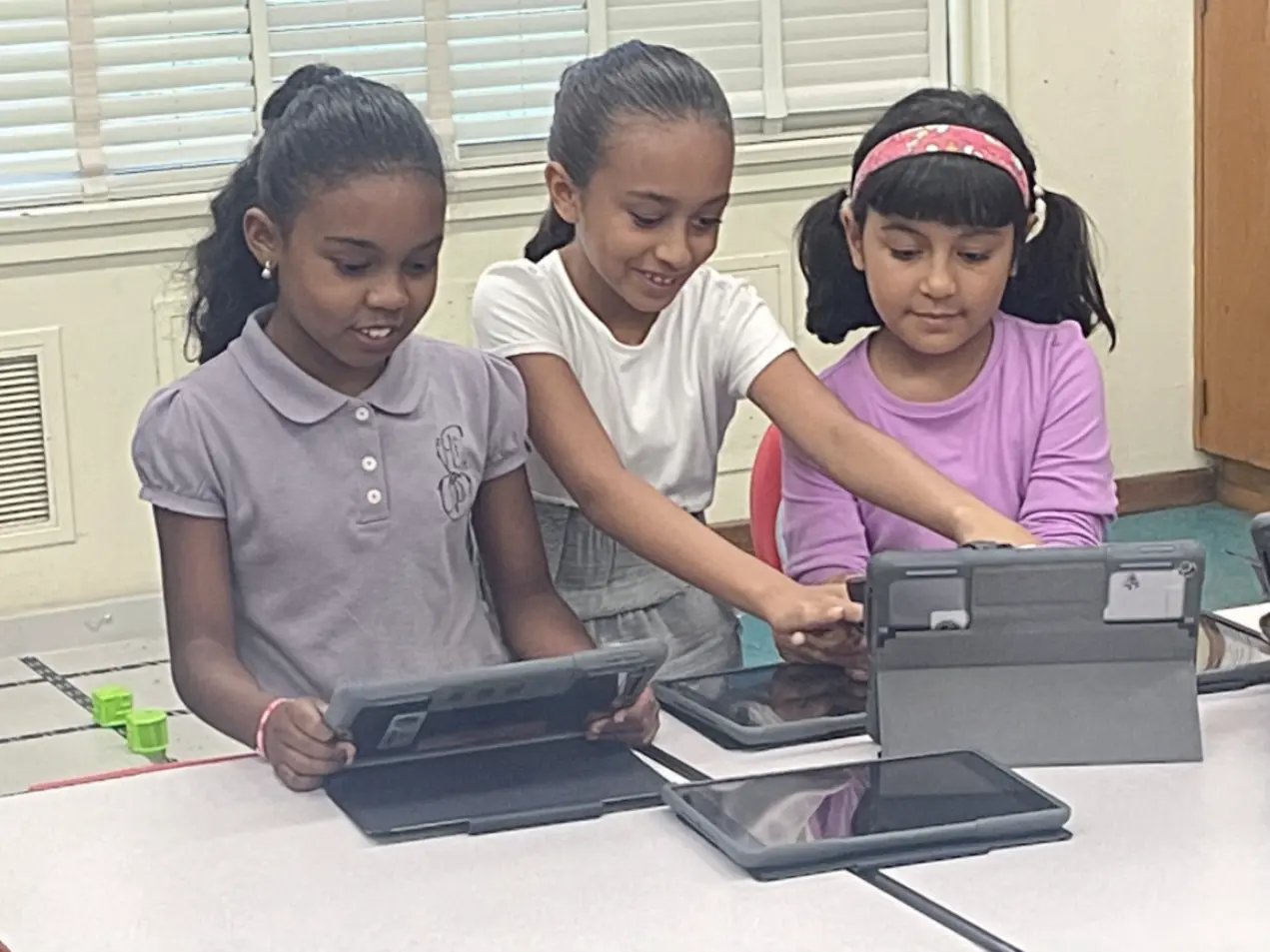 Young student working on a coding activity